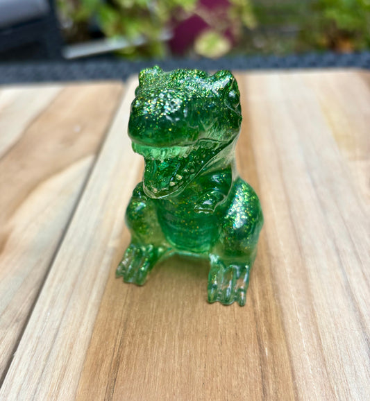 Figurine dinosaure vert à paillettes